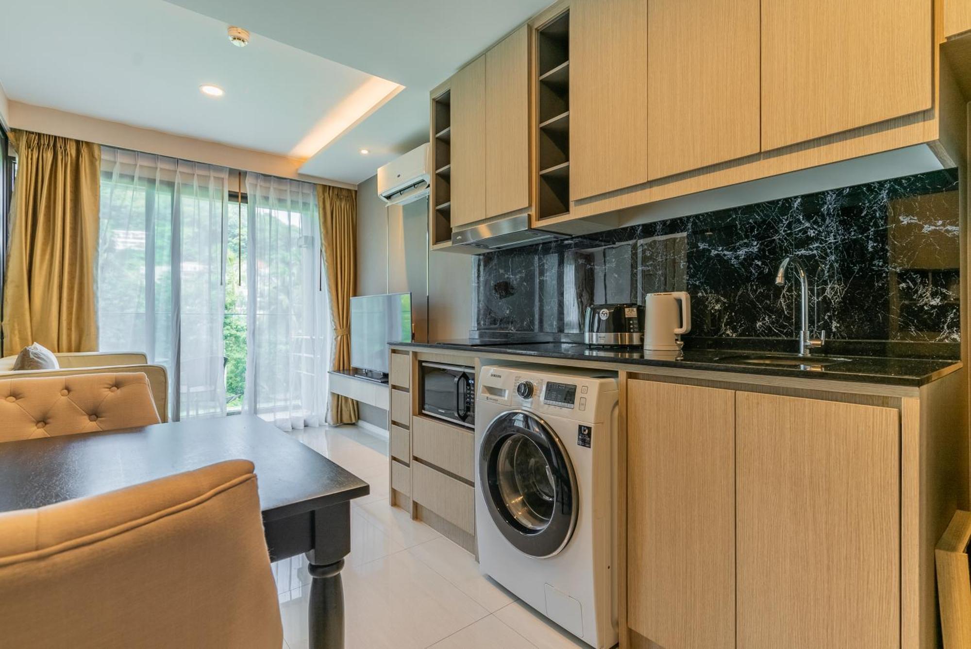 Panora Condo By Villacarte Surin Beach  Room photo